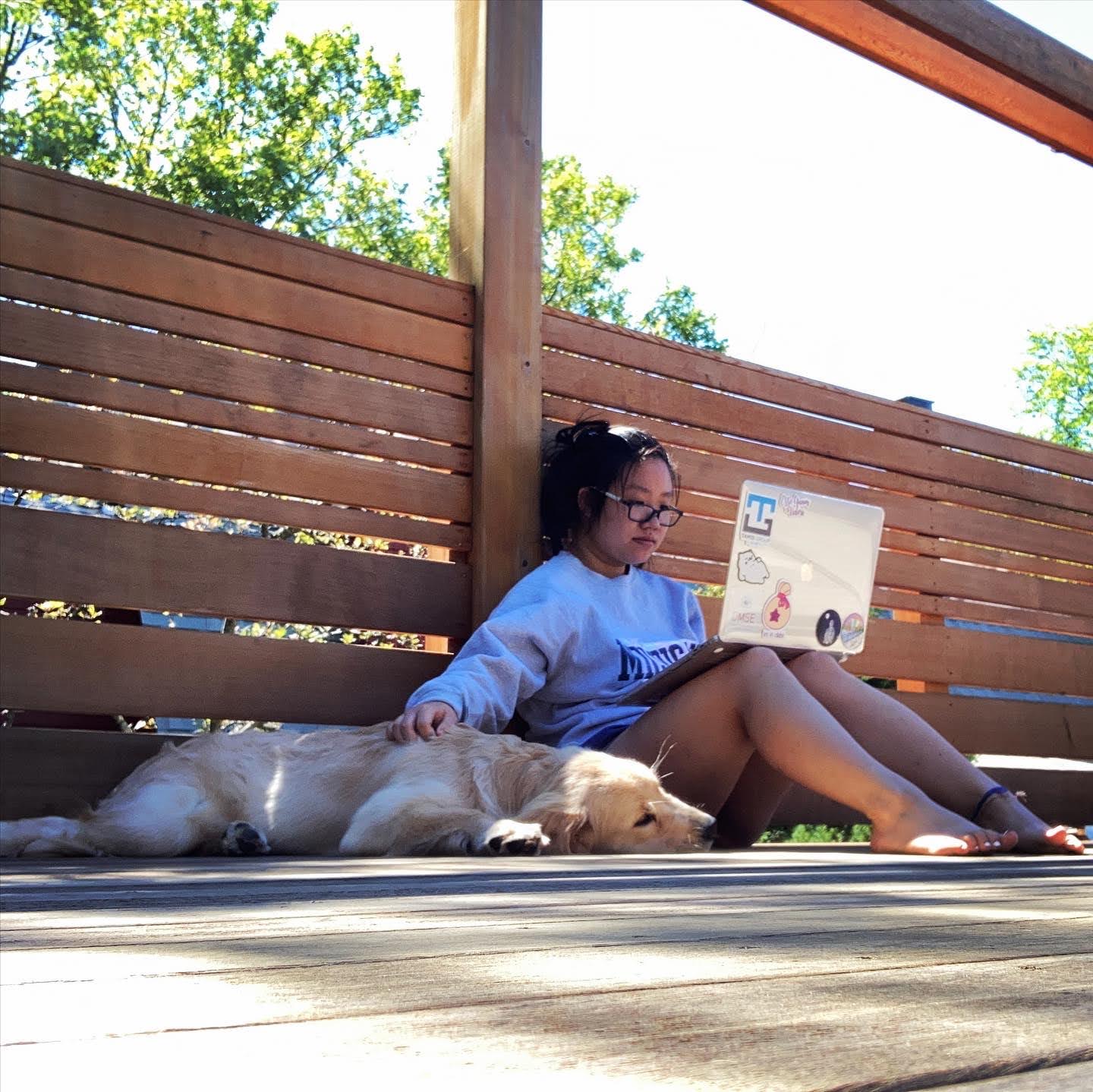 girl with a dog on a roof