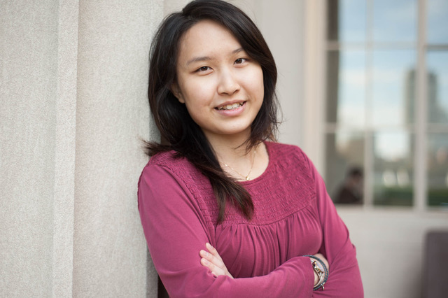 portrait of woman in magenta shirt