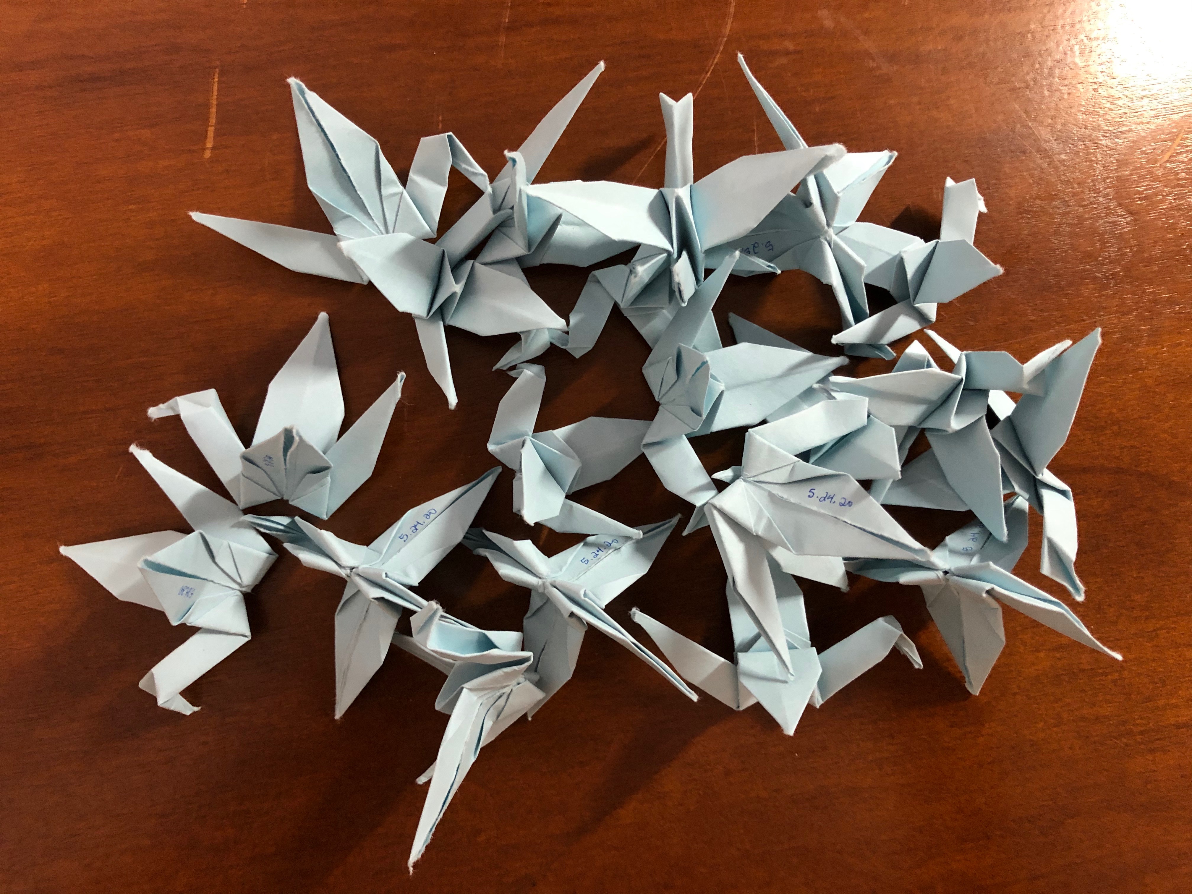 light blue origami cranes